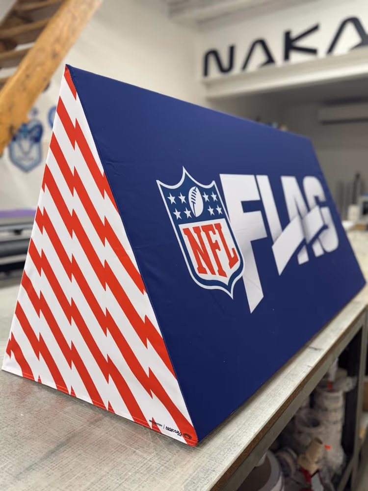 Panneau publicitaire toblerone NFL Flag